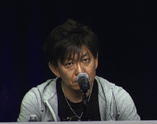 Yoshi P cringing after being asked a question.